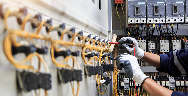 Professional Electrician technician working in Holts Summit, MO